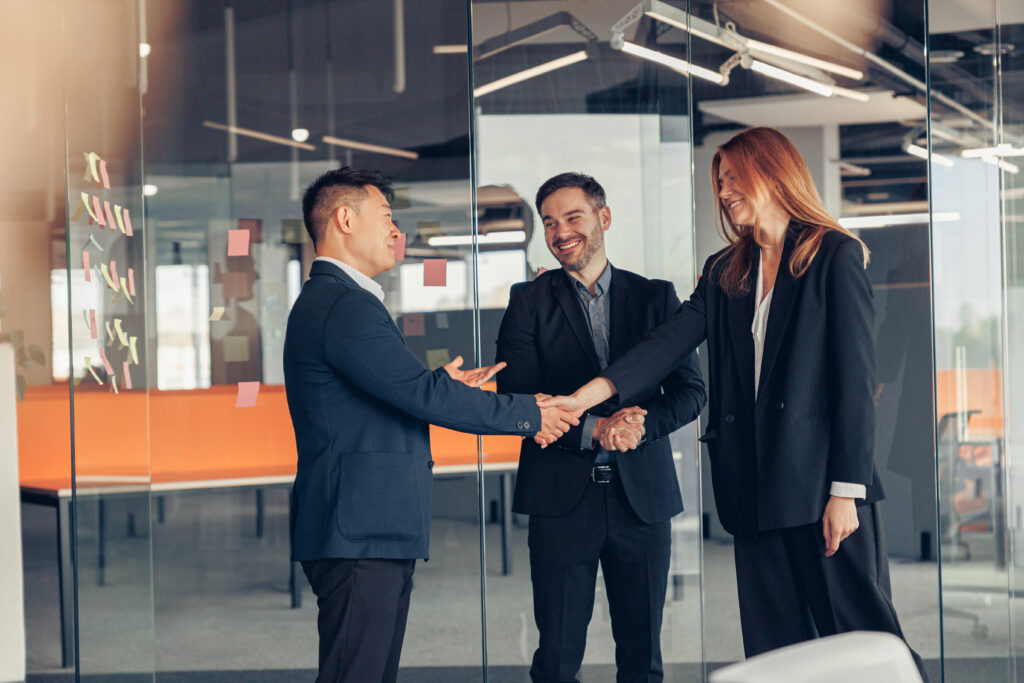 Business male partnership handshake. Successful deal after meeting