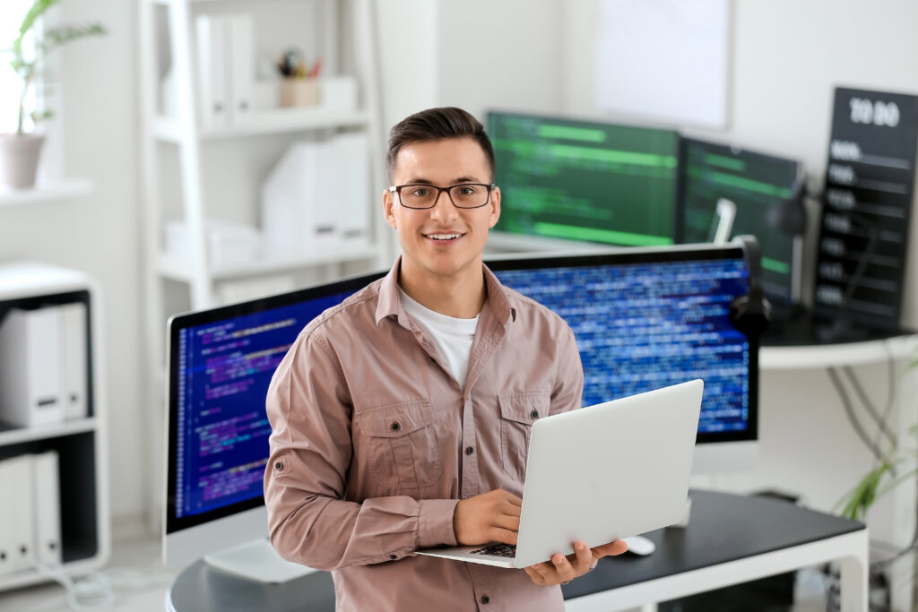 Portrait of male consultant in office