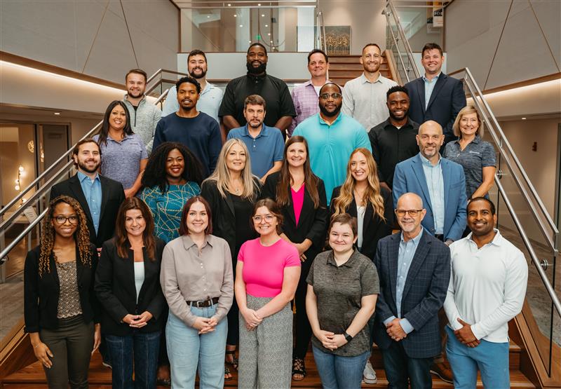 The RAMPQuest staff posing for a professional group photo